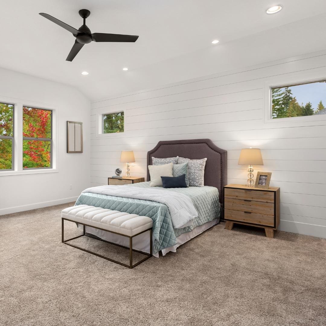 Remodelled bedroom with bed, nightstands, and ceiling fan by Artisan Painting and Remodeling, serving Portland, OR and Vancouver, WA.
